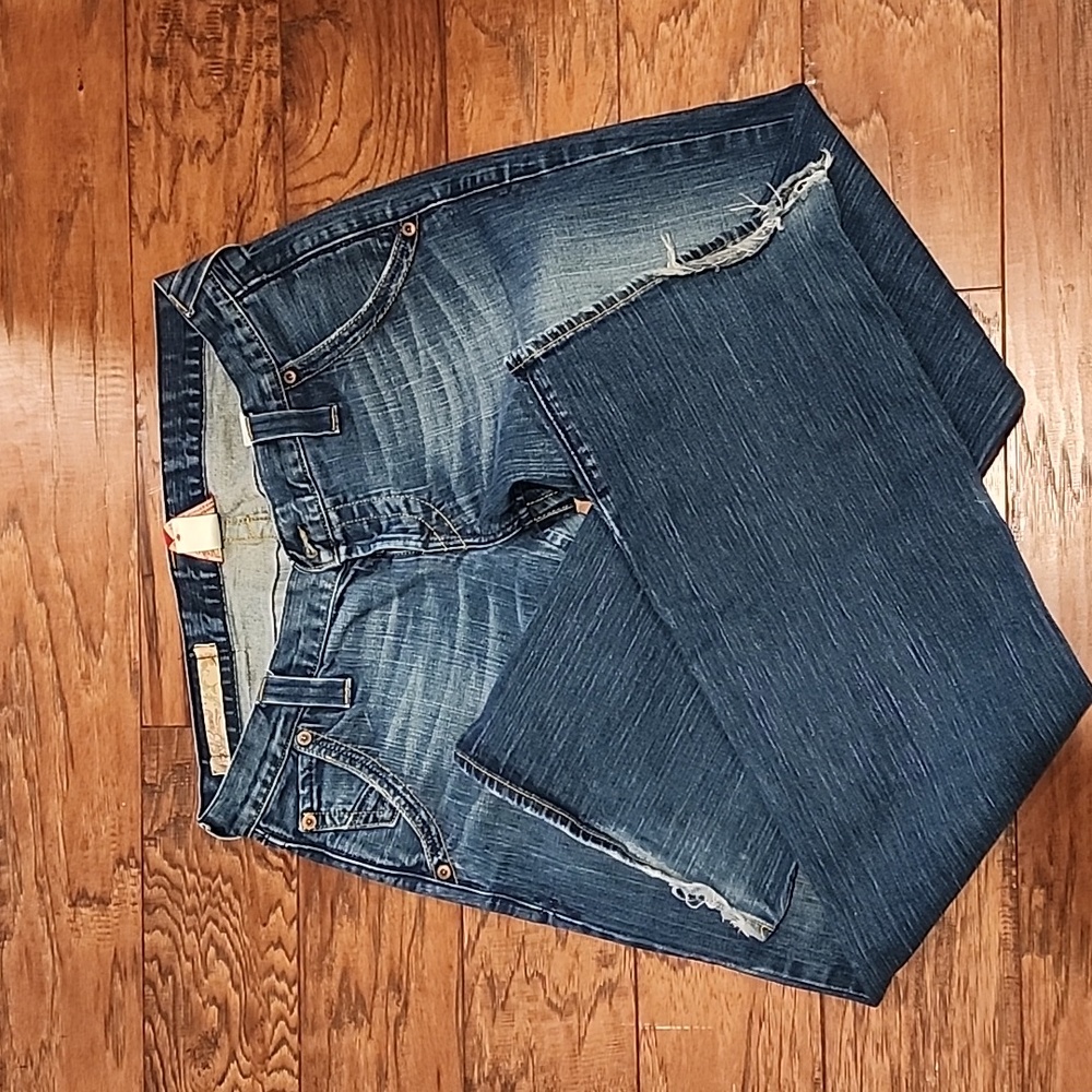 Lucky Brand. Jeans. Size 12/31. Inseam 30. Button up. Slight wear at bottom.